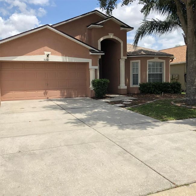 31201 Baclan Dr, House other with 4 bedrooms, 3 bathrooms and null parking in Wesley Chapel FL | Image 2