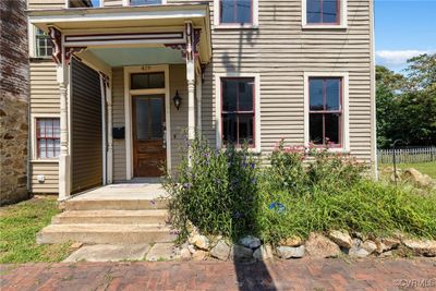 View of entrance to property- to the right of this is the empty lot and off street parking | Image 3