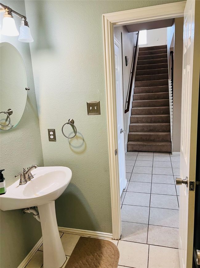 Bathroom featuring tile patterned flooring | Image 13