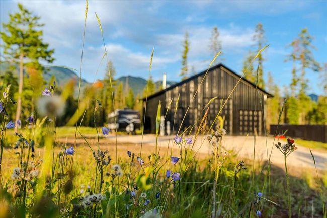 View of home's community featuring an outdoor structure and a mountain view | Image 6