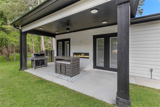 Back porch with gas fireplace | Image 9