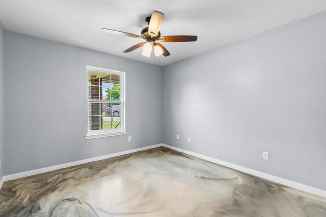 Spare room with baseboards and ceiling fan | Image 24