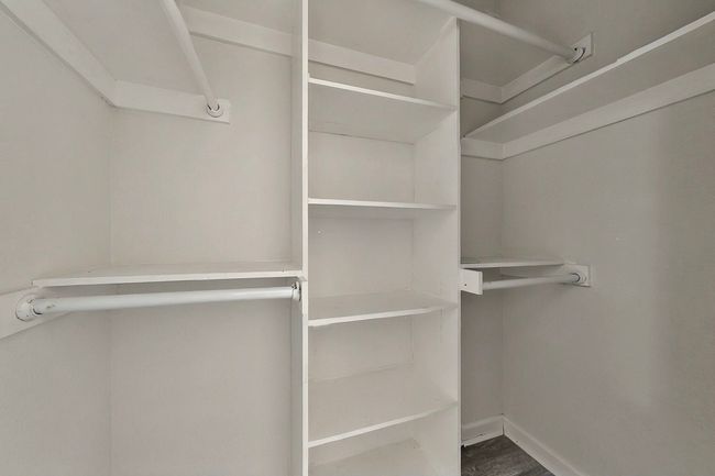 View of spacious closet | Image 8