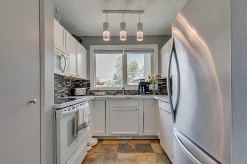 12-6440 4 St Nw, Calgary, AB, T2K1B8 | Card Image