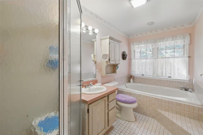 Primary bath with Jacuzzi tub | Image 15