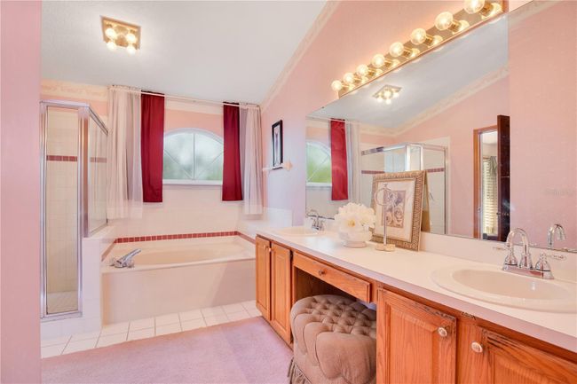 Primary En Suite Bathroom with Walk In Shower, Double Vanity and Garden Tub | Image 33
