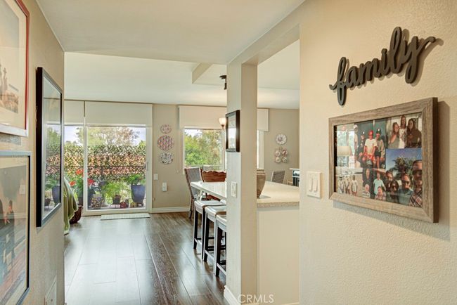 Entry to living room and kitchen from the foyer. | Image 6