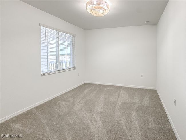 Empty room featuring carpet floors and baseboards | Image 20
