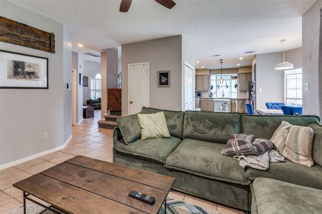 Open family room off kitchen, 2nd dining room & huge door to patio. | Image 12