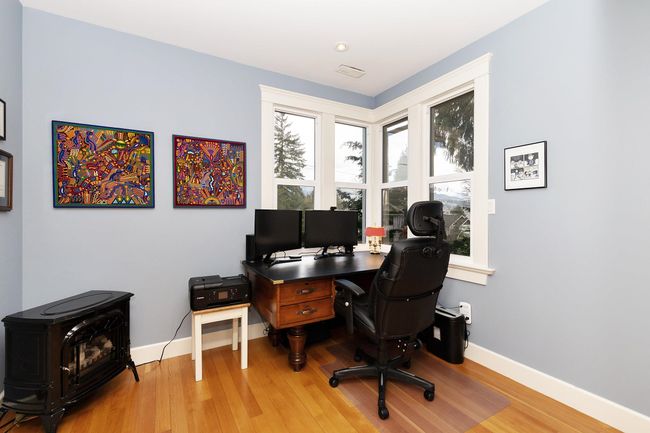 Office with visible vents, baseboards, and wood finished floors | Image 10