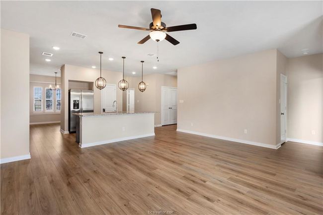 living room featuring recessed lighting, a ceiling fan, and wood finished floors | Image 4