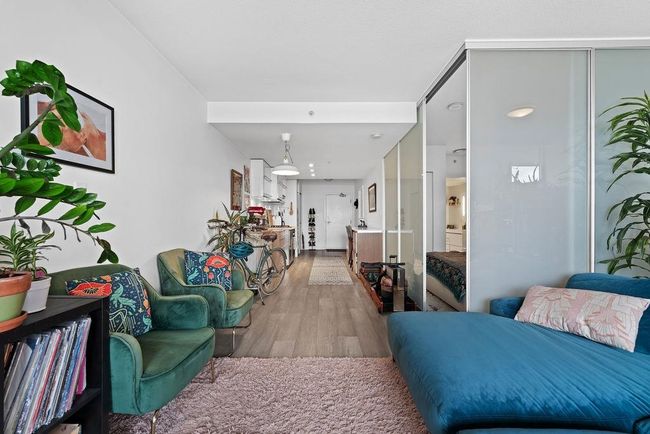 Living area featuring wood finished floors | Image 4