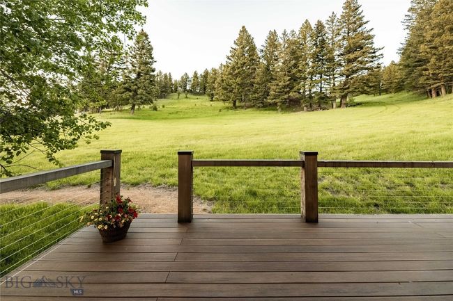 Private deck off of the guest room. | Image 44