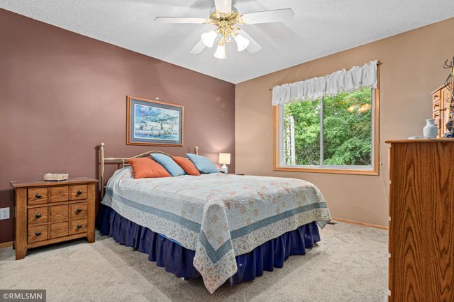 Main bedroom with private bathroom and walk in closet. | Image 10