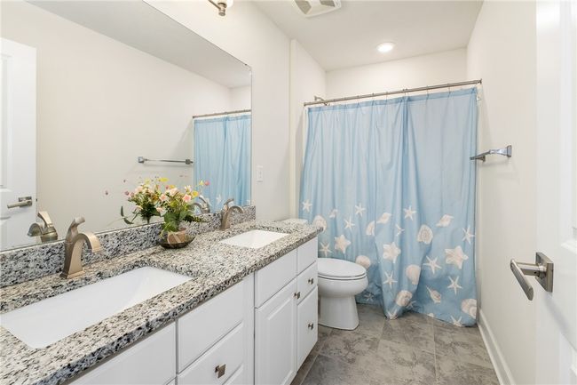Dual Sinks In The Upper Level Hallway Bathroom | Image 30
