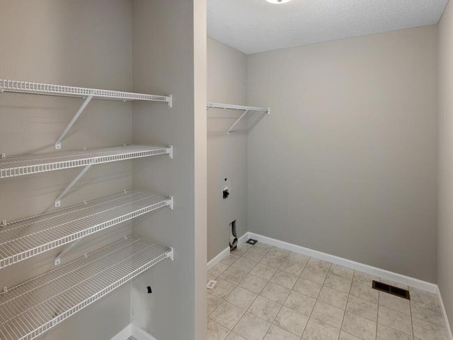 Laundry Room - Photo of similar home, finishes may vary, call list agent with questions | Image 12
