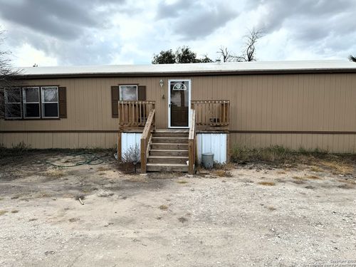 385 W County Road 5719, Devine, TX, 78016-4034 | Card Image