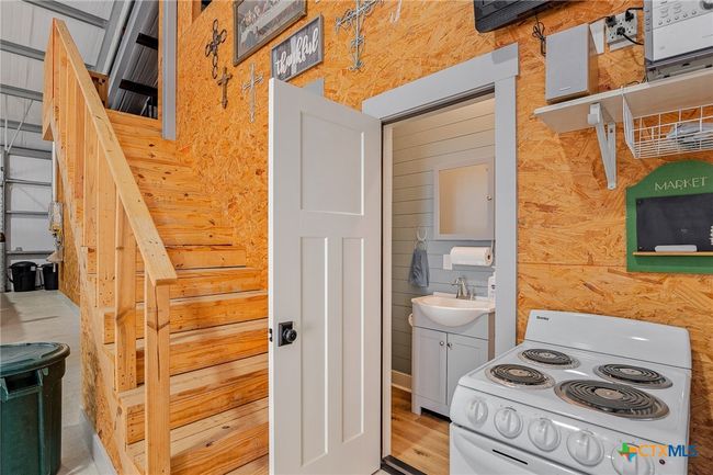 Stairs to attic/storage area | Image 28