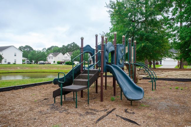 Community jungle gym featuring a water view | Image 35