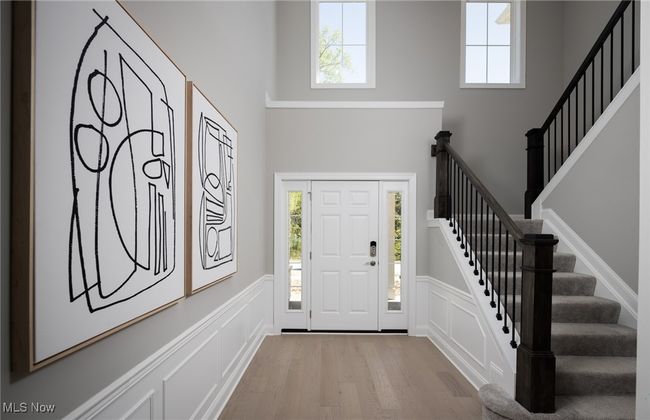 Welcoming 2-story foyer with plenty of natural light. | Image 4