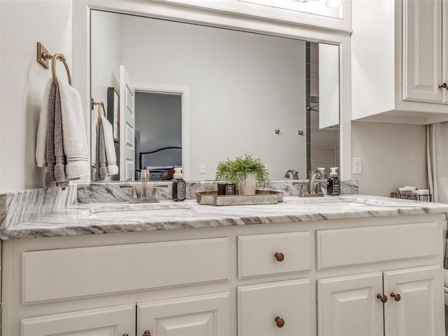 Bathroom featuring a sink and double vanity | Image 16