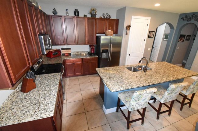 709 Calabria Way, House other with 3 bedrooms, 3 bathrooms and null parking in HOWEY IN THE HILLS FL | Image 10