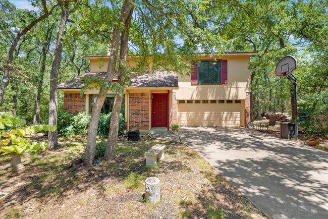 View of front of house featuring a garage | Image 12
