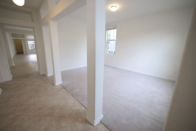 There's also a flexible use formal dining room or bonus living area! | Image 4