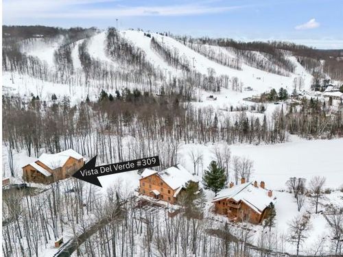 2100 W Schuss Mountain Dr, Bellaire, MI, 49615 | Card Image