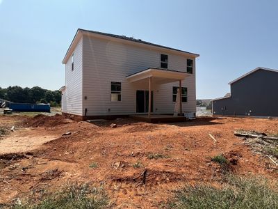 Rear view of home and covered patio | Image 2