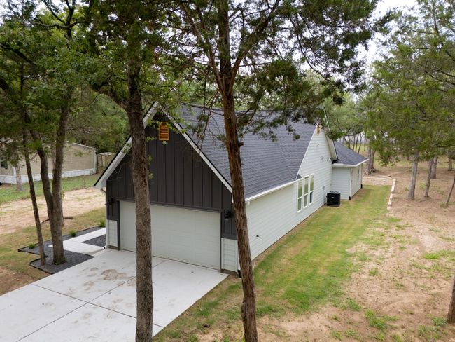 An incredible aerial view of a stunning home on nearly an acre—your dream awaits! | Image 34