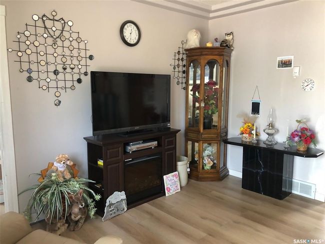 Living room with wood finished floors | Image 25