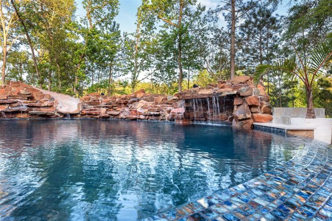 Gorgeous stonework with waterfall and hidden slide | Image 7