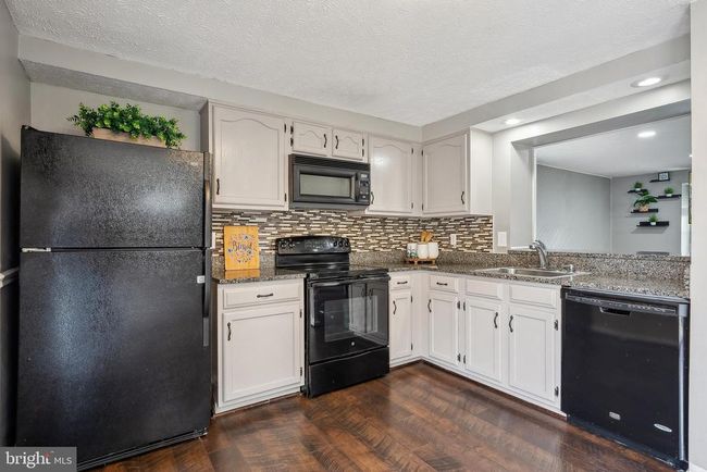 9030 Saint Steven Ct, Townhouse with 2 bedrooms, 3 bathrooms and null parking in MANASSAS PARK VA | Image 20