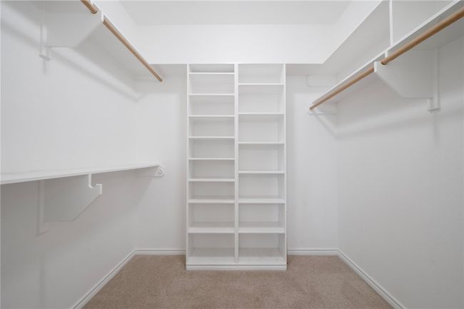 Walk in closet featuring carpet floors | Image 20