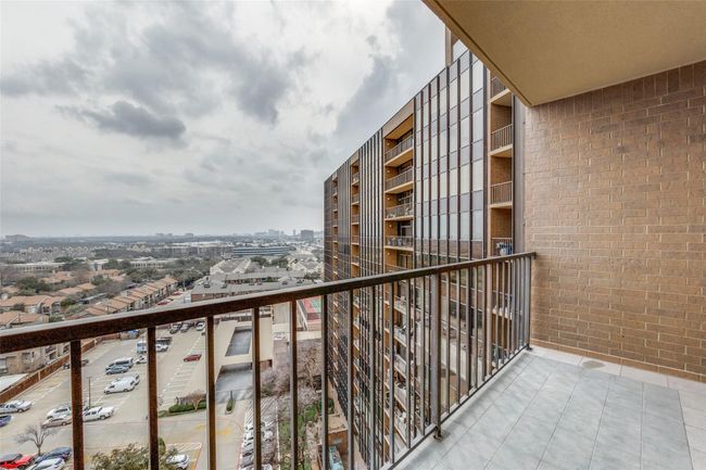 Balcony with a view of city | Image 10