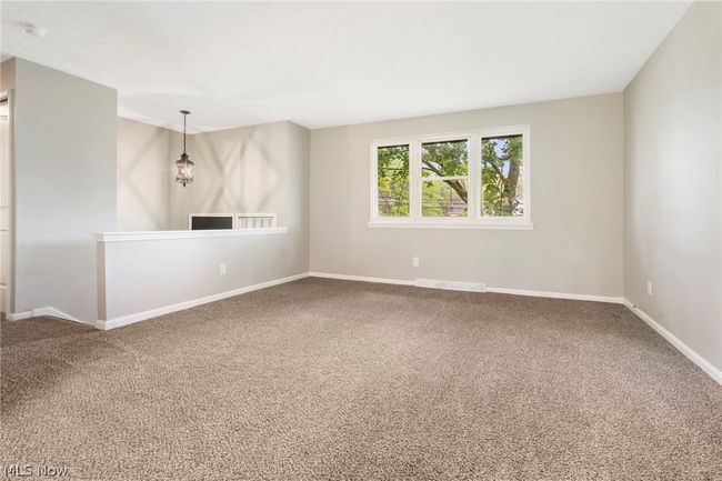 View of carpeted living room | Image 6