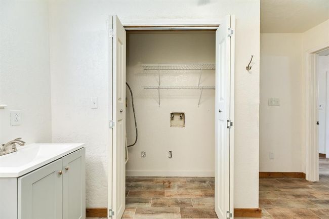 Utility Area is inside the bi-fold doors in the First Floor Full Bathroom. | Image 34
