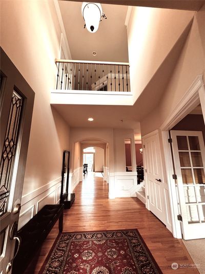 Two-Story Main Floor Entry Foyer with Hardwood Floors. | Image 3