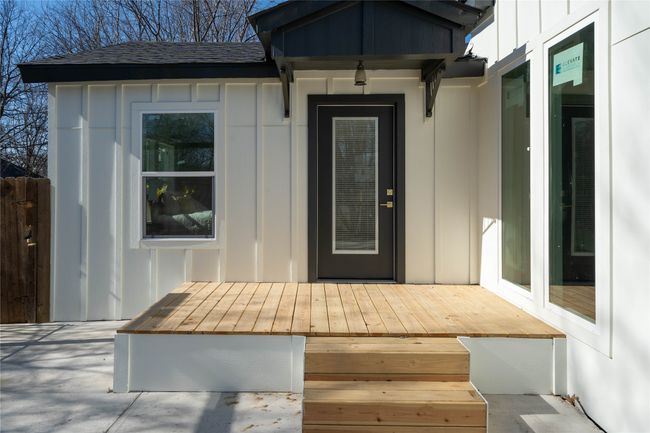Doorway to property featuring a deck | Image 5