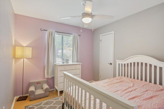secondary bedroom with walk-in closet | Image 22