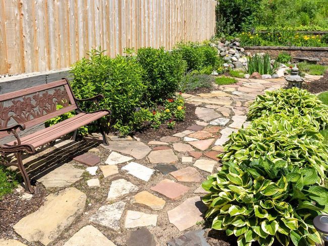 Enjoy the lovely backyard with walking path | Image 55