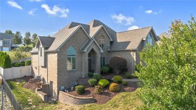 LEFT SIDE VIEW FROM KATHY DRIVE WITH EASY WALK OUT FROM THE LOWER LIVING AREA | Image 2