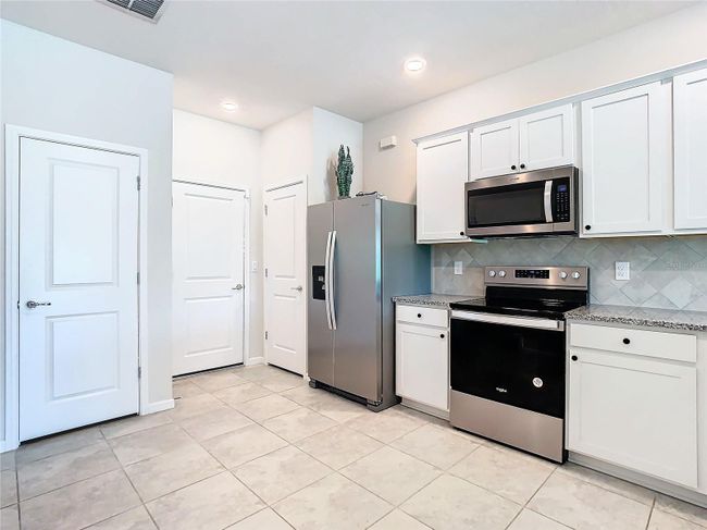 Additional kitchen storage and pantry in kitchen | Image 13