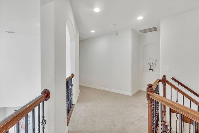 Hall with an upstairs landing, carpet floors, and recessed lighting | Image 23