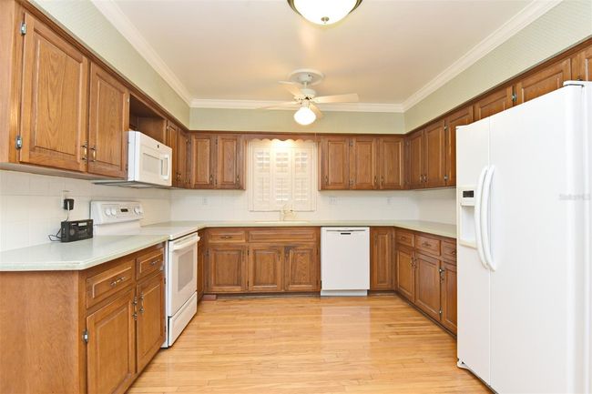 Kitchen w/ wood flooring Pic 1 | Image 27