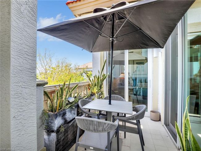 Balcony with outdoor dining area | Image 26