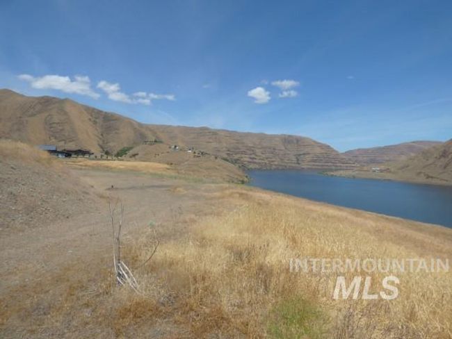 Water view featuring a mountainous background | Image 13