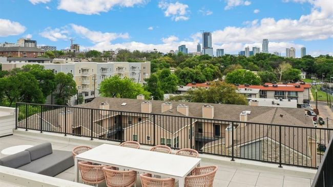 View of patio with a view of skyline | Image 9