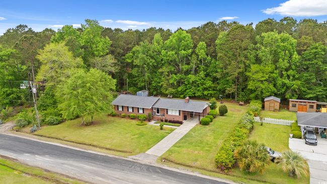 Drone / aerial view featuring a wooded view | Image 24